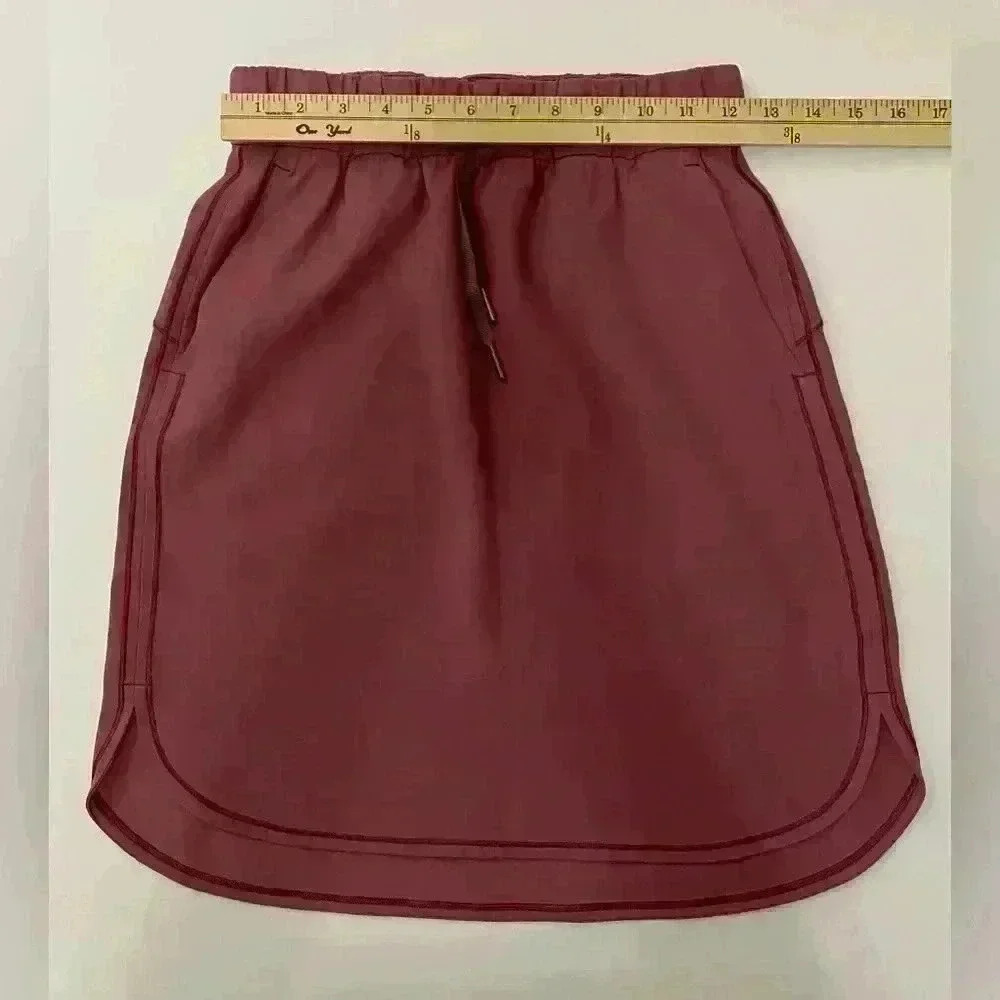 Lululemon On The Fly Skirt
Woven Misty Merlot  Rose Pink Size 4 - Picture 6 of 9